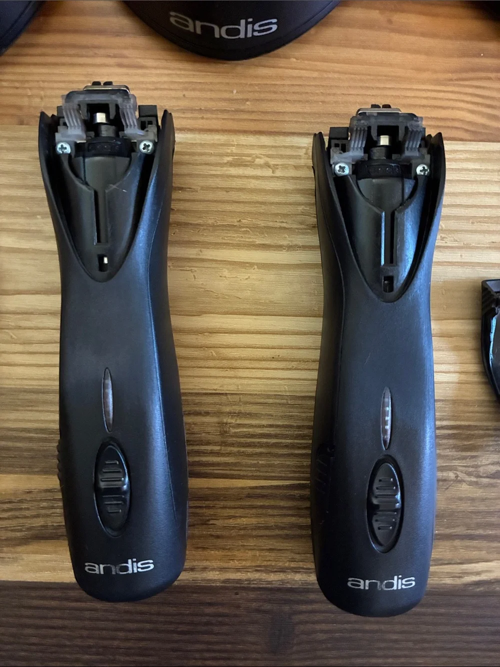 Andis Black Cordless Trimmer Handles with Charging Docks